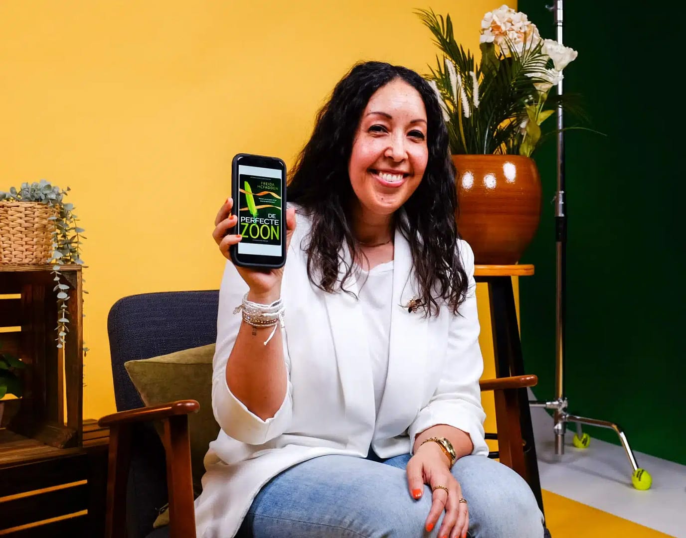 Creative video agency team member showcasing mobile video content.