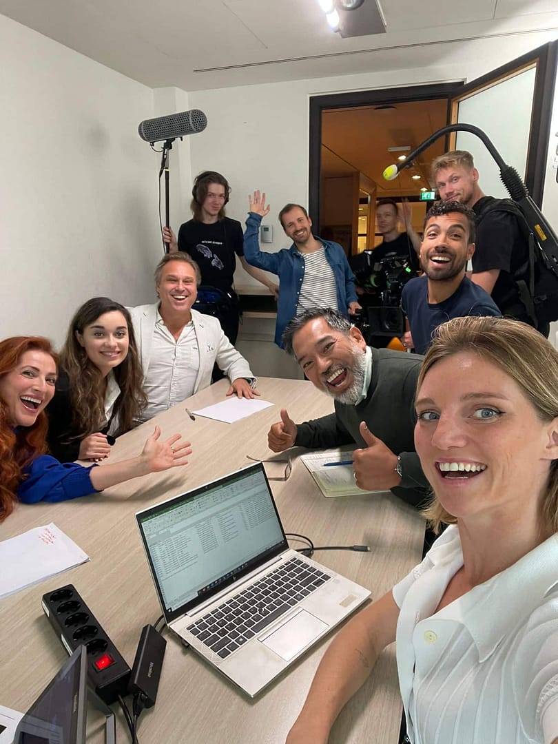 Creative video team collaborating at Waves Video Agency office.